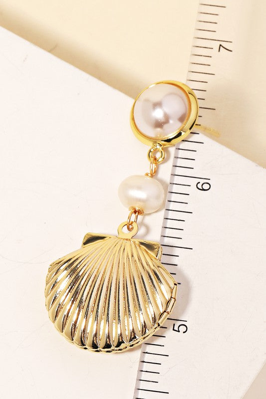 Gold shell on sale drop earrings